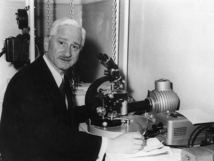 Polio-BruceSabin-Unknown Albert Bruce Sabin with a microscope