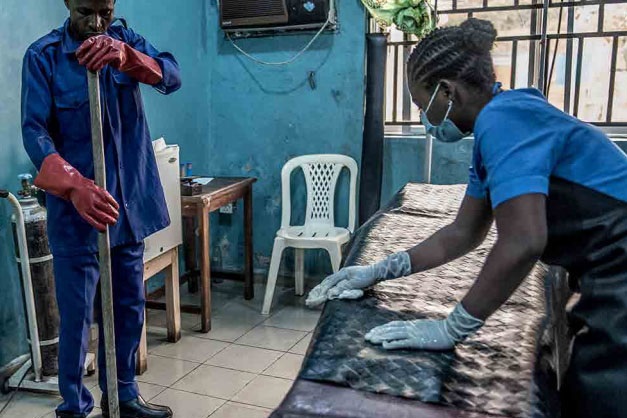 cleaning-disinfecting Staff cleaning health care facilities