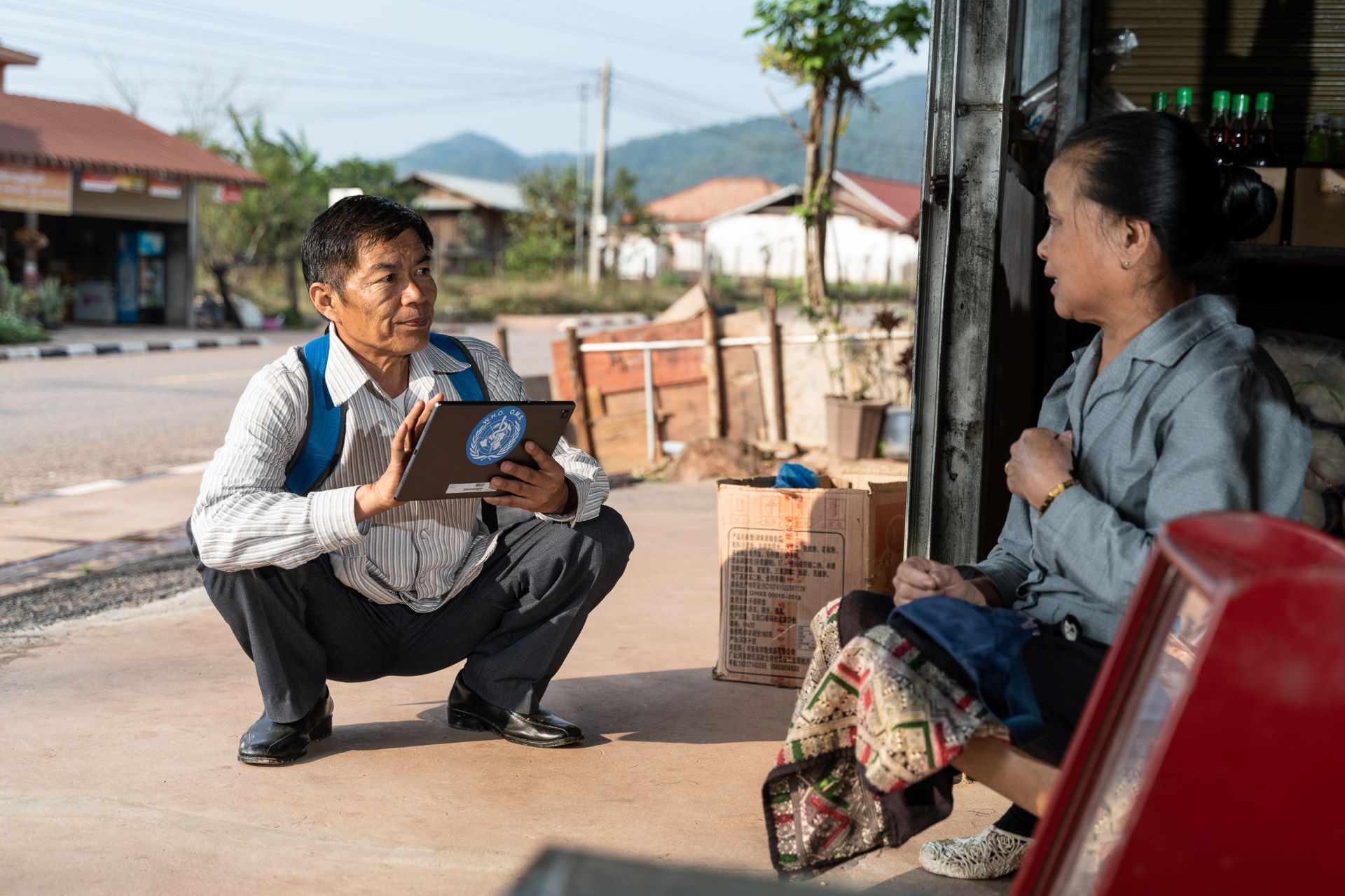 20230316_Phongsaly-560 Ministry of Health official conducts a survey with store owner