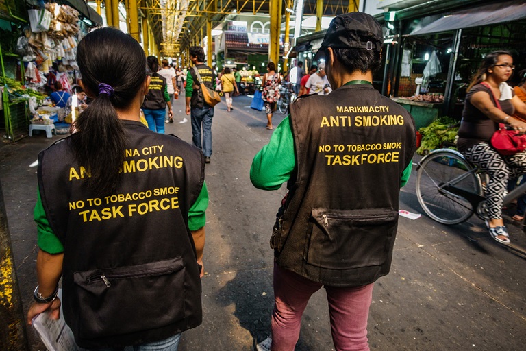 2005 A team of Marikina Anti-Smoking Task Force heads out to patrol the city. The city prohibits establishments from selling cigarettes to minors.